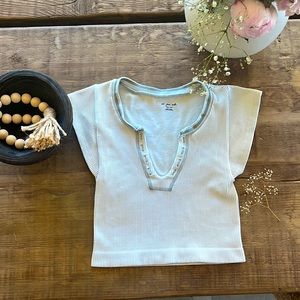 Out from under white cropped shirt, from urban outfitters.